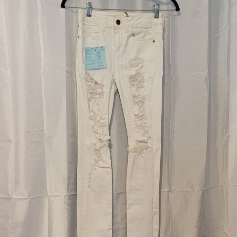 ALICE + OLIVIA DISTRESSED WHITE STRETCHY JEANS